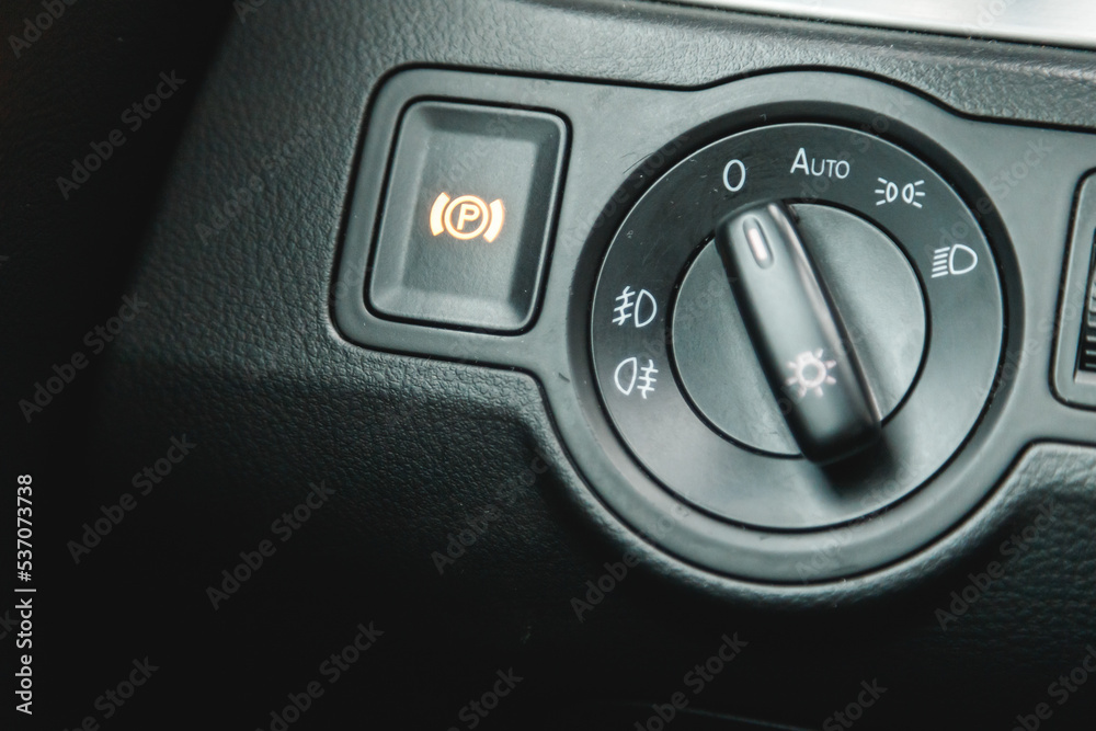 Car button for electronic handbrake activated. Parking brake