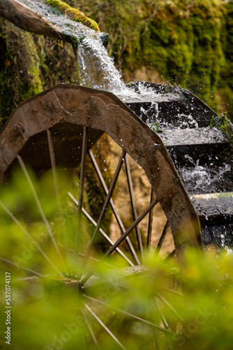The wooden wheel of an old water mill