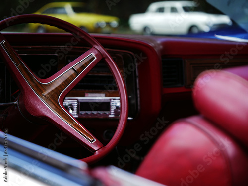 Vintage classic car dashboard and steering wheel medium shot © Angela
