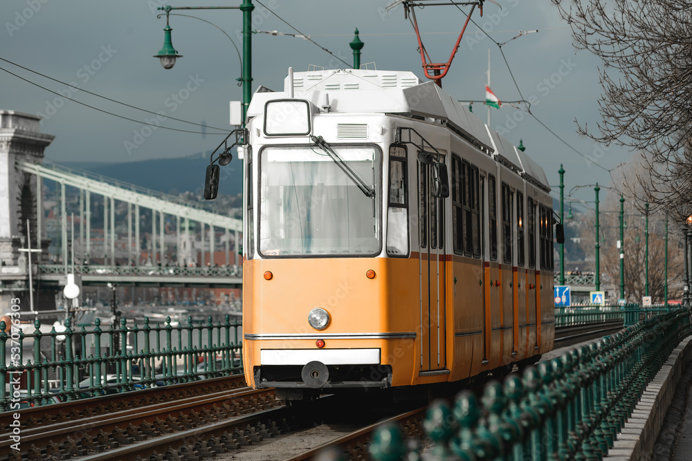 Vintage orange tram somewhere in Budapest, Hungary