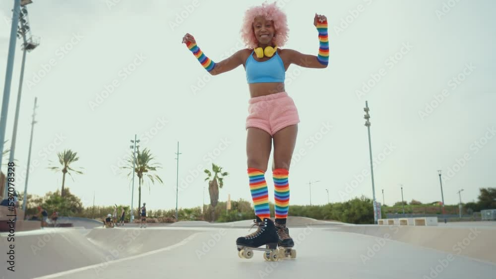 Beautiful woman skating with roller skates and having fun. Professional skater and dancer training in the morning