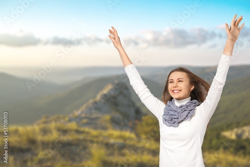 Woman open arms at nature field. Freedom concept