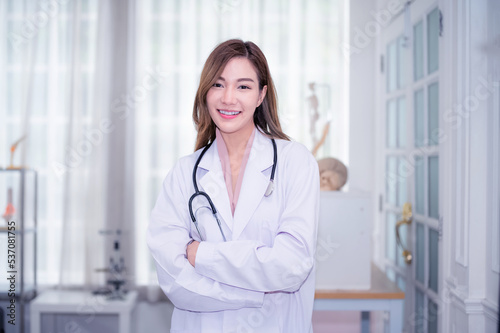 Asian woman doctor in hospital concept, Asian woman doctor holding stethoscope standing in hospital , Asian woman doctor in hospital design for hospital website banner