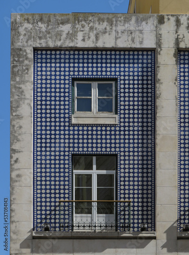 Detail of traditional colorful tiled facade. Lisbon. Portugal.