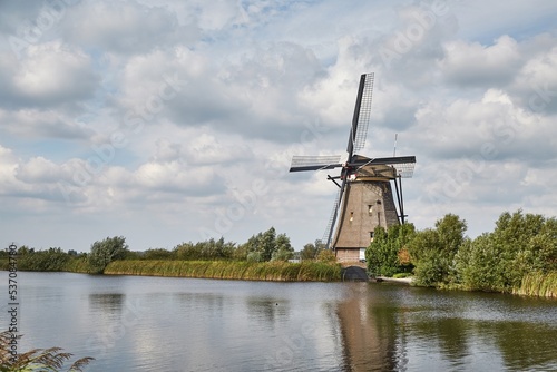 Windmill beside a canal