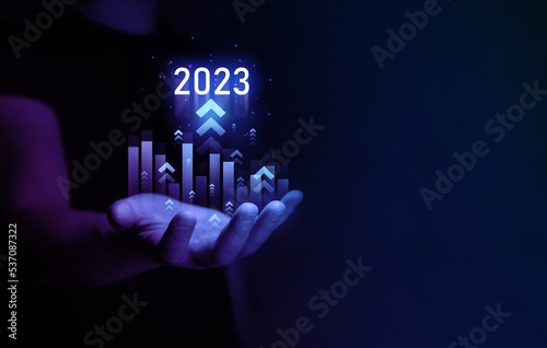 Increase arrow graph corporate future growth year 2022 to 2023. Planning,opportunity, challenge and business strategy. New Goals, Plans and Visions for Next Year 2023.