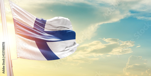 Finland national flag cloth fabric waving on the sky - Image