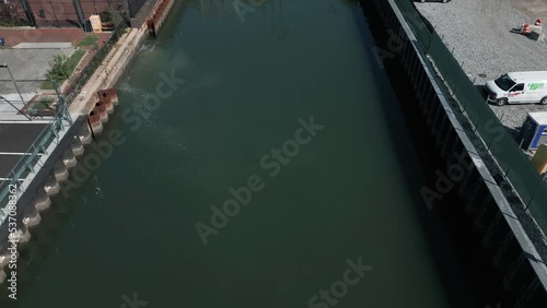 higher flying over Gowanus Canal tilting up revealing downtown Brookyn photo