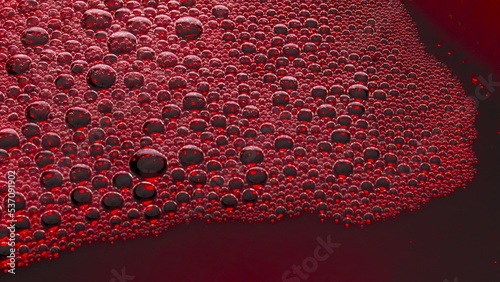 Foto Foamy alcoholic drink surface top view