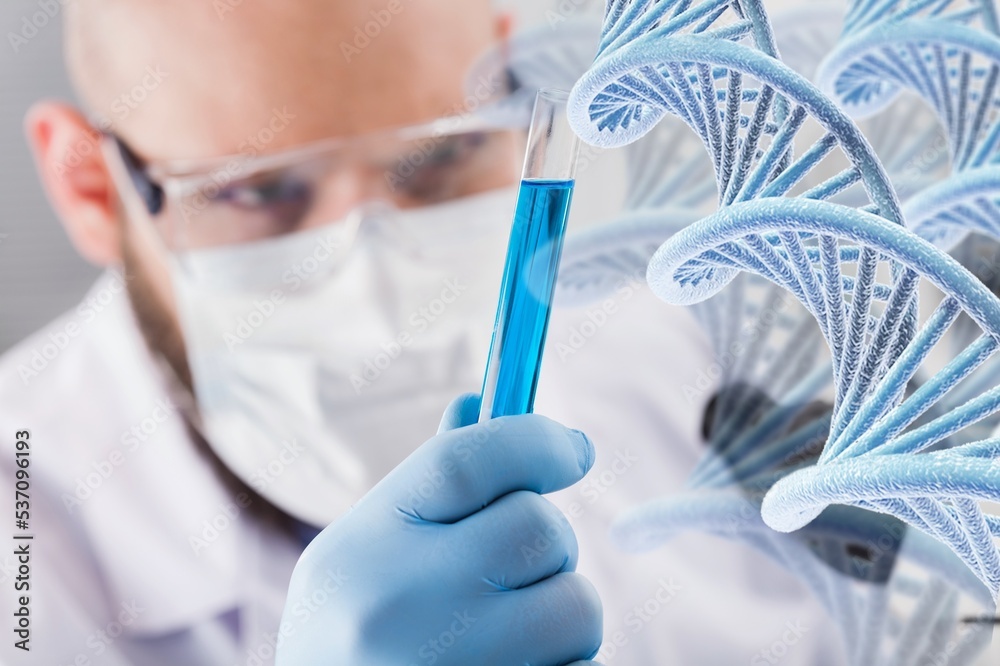 Scientists man with molecule of DNA with light background. Scientists man with molecule of DNA with light background.