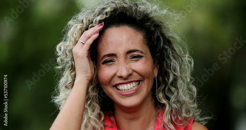 Woman spontaneous laugh, person burst laughing out loud, real life smile