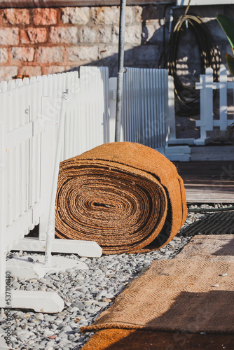 Nice, France - 29.09.2022 : Rolled up carpet during the dismantling of the seasonal private beach in Nice