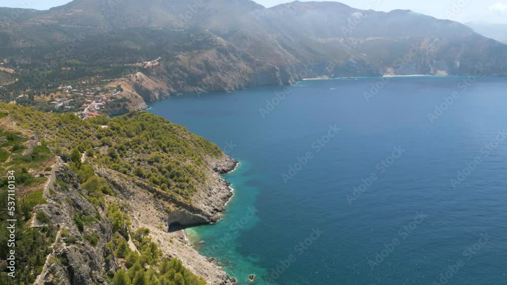 Aerial drone view of coast and blue water in northern Kefalonia, Greece (4k, UHD) Aerial drone view of coast and blue water in northern Kefalonia, Greece (4k, UHD)