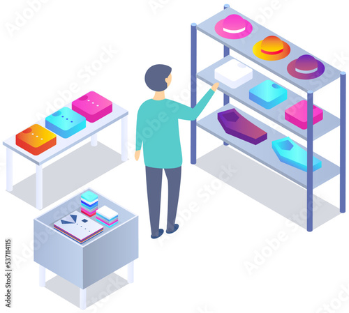 Customer choosing garments in mens clothing store. Male buyer buys hat, shirt and trousers during shopping. Purchaser service in mall. Guy shopper stands near shelf with clothes in shop or boutique