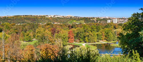 Photography Sunny Autumn Day at the Park, Colorful Trees, Pond and Walking Path in Valley wi