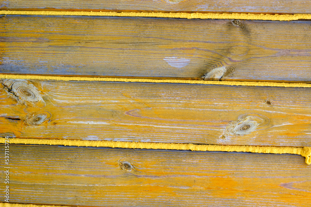 sprayed and hardened polyurethane foam from a cylinder on the wall of