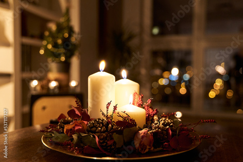 homemade Christmas centerpiece decor with Christmas tree on the background photo
