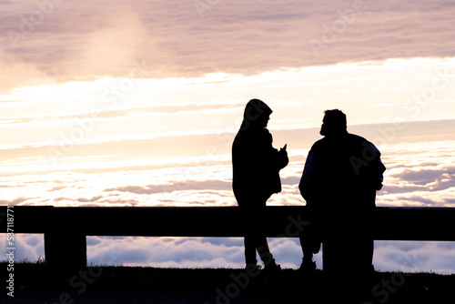 Couple Sit on Guardrail Along Blue Ridge Parkway and Enjoy Cloud Inversion