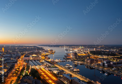 Beautiful aerial night cityscape of Kiel  Schleswig-Holstein  Germany  at blue hour 