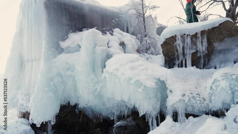 A huge block of frozen ice. Incredibly large icicle. A huge block of frozen ice. Incredibly large icicle.