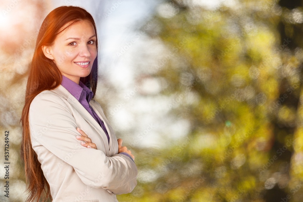 Beautiful woman posing outdoors in autumn Beautiful woman posing outdoors in autumn
