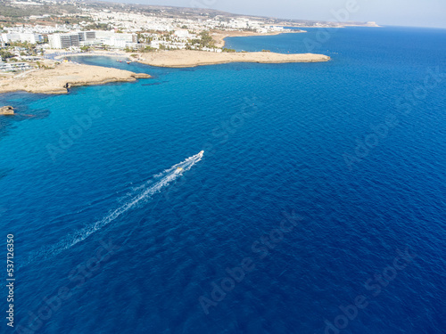 Aerial panoramic view on blue crystal clear water on Mediterranean sea near Nissi beach, Ayia Napa, Cyprus