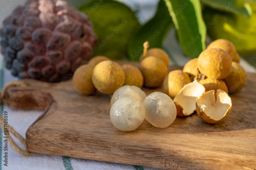 Tasty tropical exotic fruits, ripe fresh peeled lychee fruits Tasty tropical exotic fruits, ripe fresh peeled lychee fruits