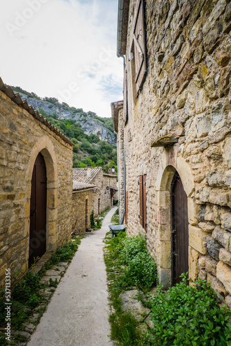 View on the beautiful stone facades and medieval houses of the small historical village of Rochecolombe in the South of France  Ardeche 