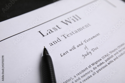 Pen on last will and testament, closeup