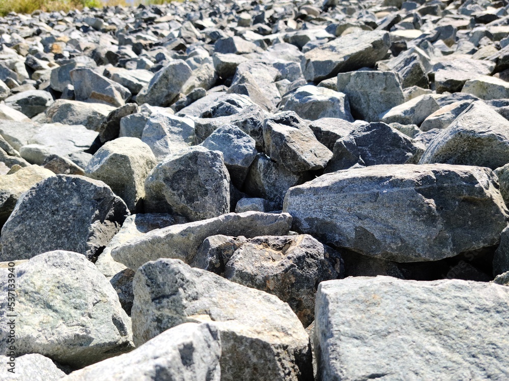 Granite Waste rock large piles under the sun
