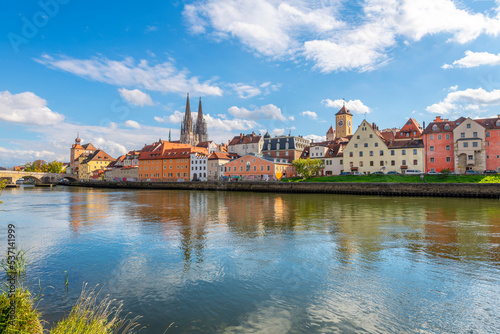 The picturesque skyline including the stone bridge over the Danube River, Saint Peter's Church and Regensburg Town Hall in the Bavarian city of Regensburg, Germany.