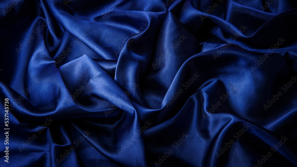 Obraz premium しわのある青いサテンの布の背景テクスチャー