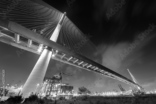 Photography Night scenery of cargo port and suspension bridge in Hong Kong city