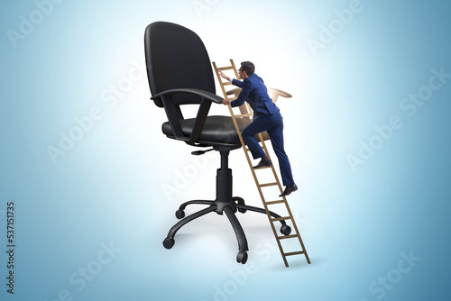 Businessman in the career concept climbing chair