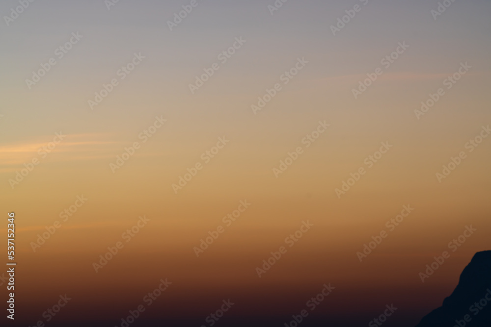 Background of colorful sky concept: Dramatic sunset with twilight color sky and clouds