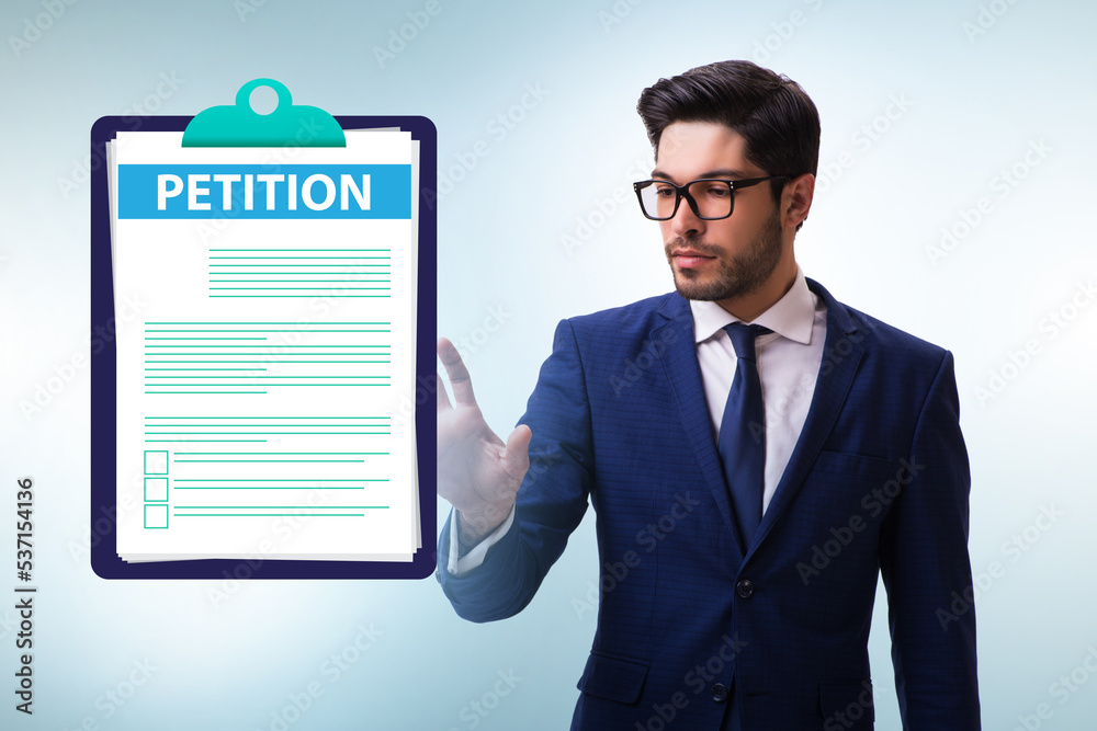 Businessman in petition application concept Businessman in petition application concept