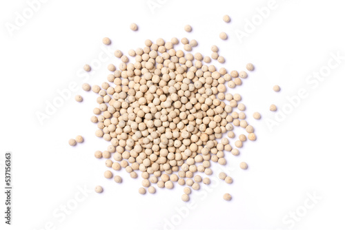 White pepper seeds (peppercorns) isolated on white background, top view, flat lay.