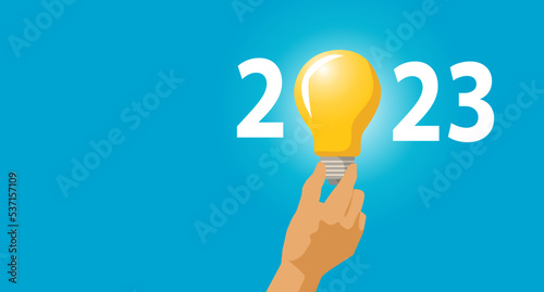 Idea and creative in 2023; lighting bulb with new year 2023 number on blue background