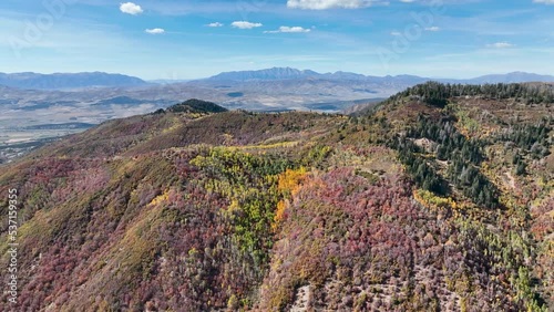 Aerial mountain canyon autumn colors descend fast. Central Utah. Beautiful mountain canyon valley and trails. Travel destination. Golden yellow, golden, red and orange leaves. Explorin photo