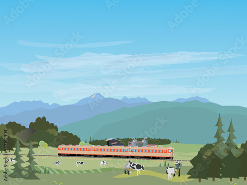北海道の牧場を走る列車