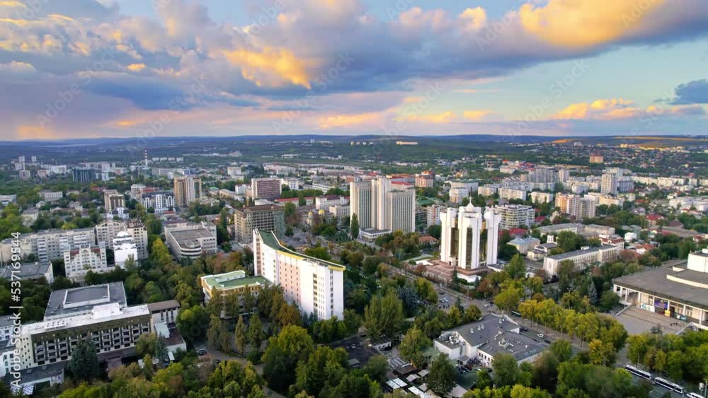 Aerial drone view of Chisinau, Moldova. View of city centre with presidency and parliament, multiple buildings, roads, lush greenery Aerial drone view of Chisinau, Moldova. View of city centre with presidency and parliament, multiple buildings, roads, lush greenery