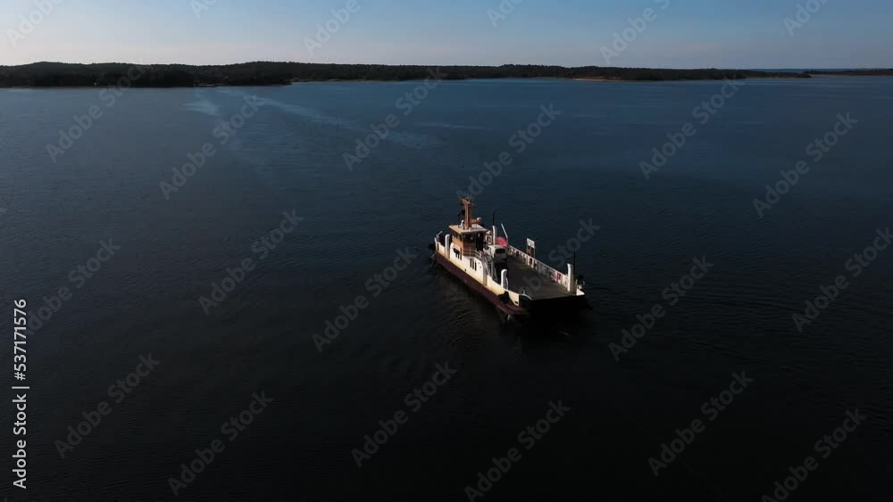 Aerial view around a ferryboat in the archipelago of Ahvenanmaa, Finland - orbit, drone shot Aerial view around a ferryboat in the archipelago of Ahvenanmaa, Finland - orbit, drone shot