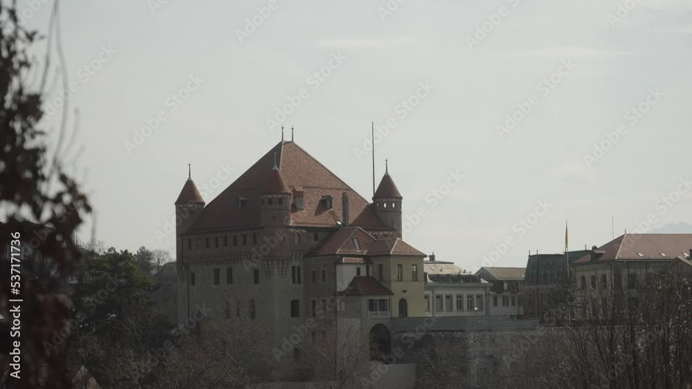 Government building in Lausanne with Ukrainian flag. 4K Slow Motion. war issue. Government building in Lausanne with Ukrainian flag. 4K Slow Motion. war issue.
