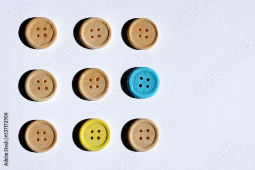 An example of nine wooden buttons on a white background ...