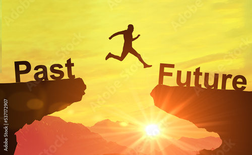 Silhouette man jumping between cliff with Past to Future. Jump over cliff Past and Future. keep go on to success.