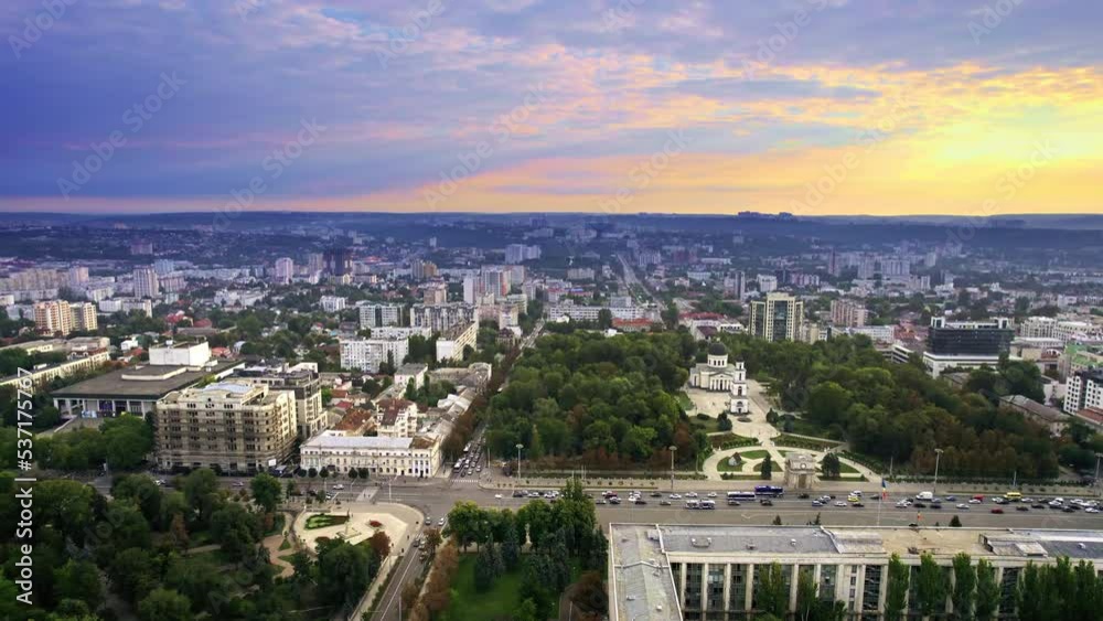 Aerial drone view of Chisinau downtown at sunrise, Moldova. Panoramic view of Central Park, Cathedral, Goverment a lot of greenery, buildings Aerial drone view of Chisinau downtown at sunrise, Moldova. Panoramic view of Central Park, Cathedral, Goverment a lot of greenery, buildings