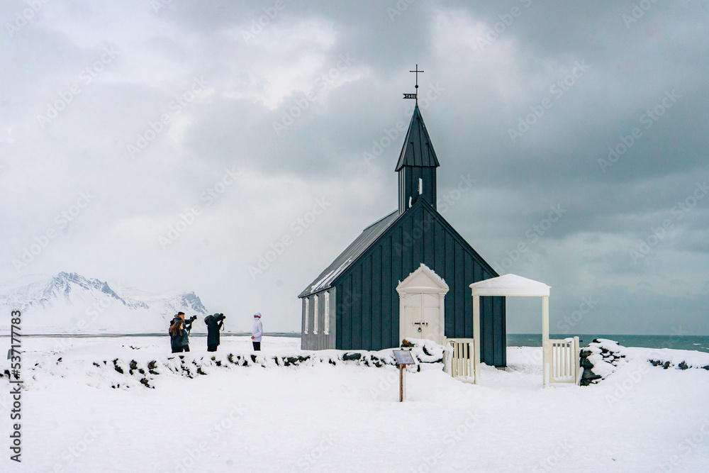 Búðakirkja or Budakirkja , Tiny wooden balck church near Snæfellsnes Peninsula during winter cloudy day at Budir , Western region of Iceland : 15 March 2020