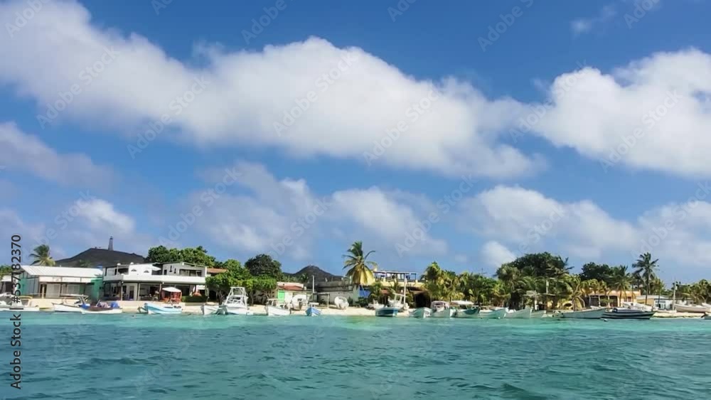 POV watching shore Beach Of Fishing Village Harbour, Los Roques Venezuela POV watching shore Beach Of Fishing Village Harbour, Los Roques Venezuela