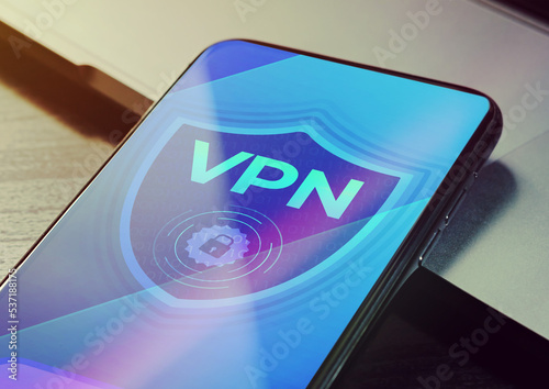 VPN - Virtual private network application for encrypt connection, anonymous internet using and unblock websites. Close up vpn security network sign logo on the smartphone screen 