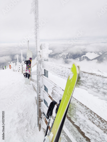 ski stick in snow mountains on background